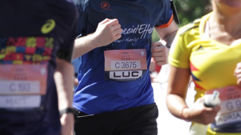 A picture of myself (Luc Shelton) running between two other participants towards the finish line at the ASICS London 10K.
