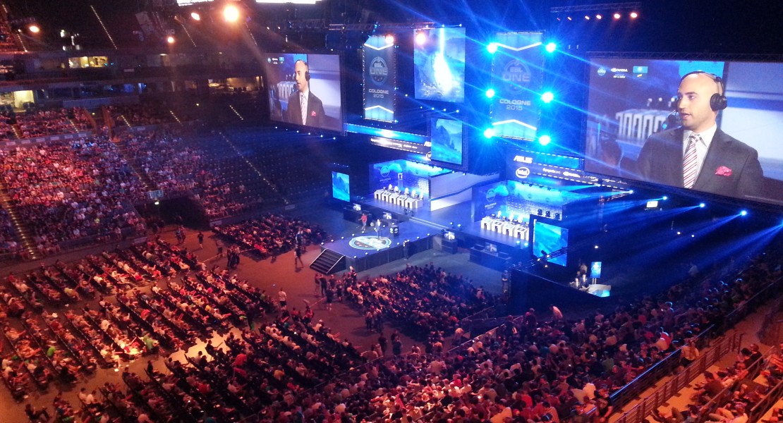 LANXESS Arena from the VIP seating area. The caster Json "moses" O'Toole presenting in front of the stadium audience before the next game.
